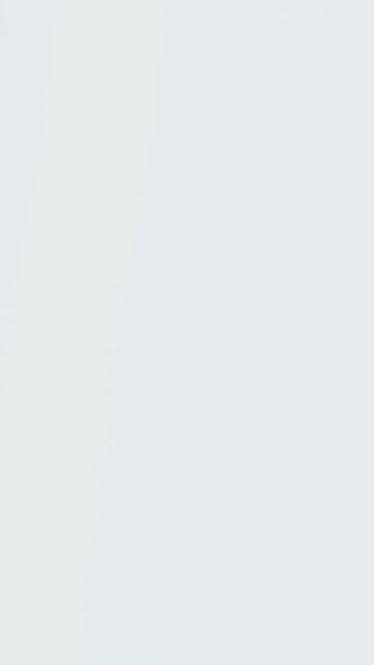 Drizzling organic olive oil and rosemary  over tomato bruschetta toasts

